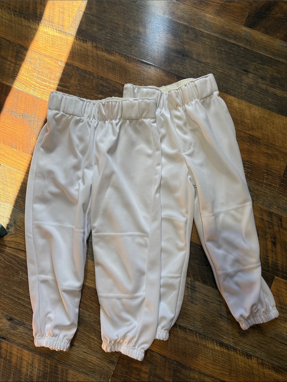 2 pair unisex baseball pants.